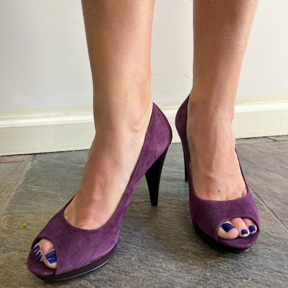 Suede peep toe pump in purple with a wooden stacked heel